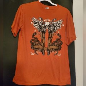 Orange guns, skull, & snakes shirt M